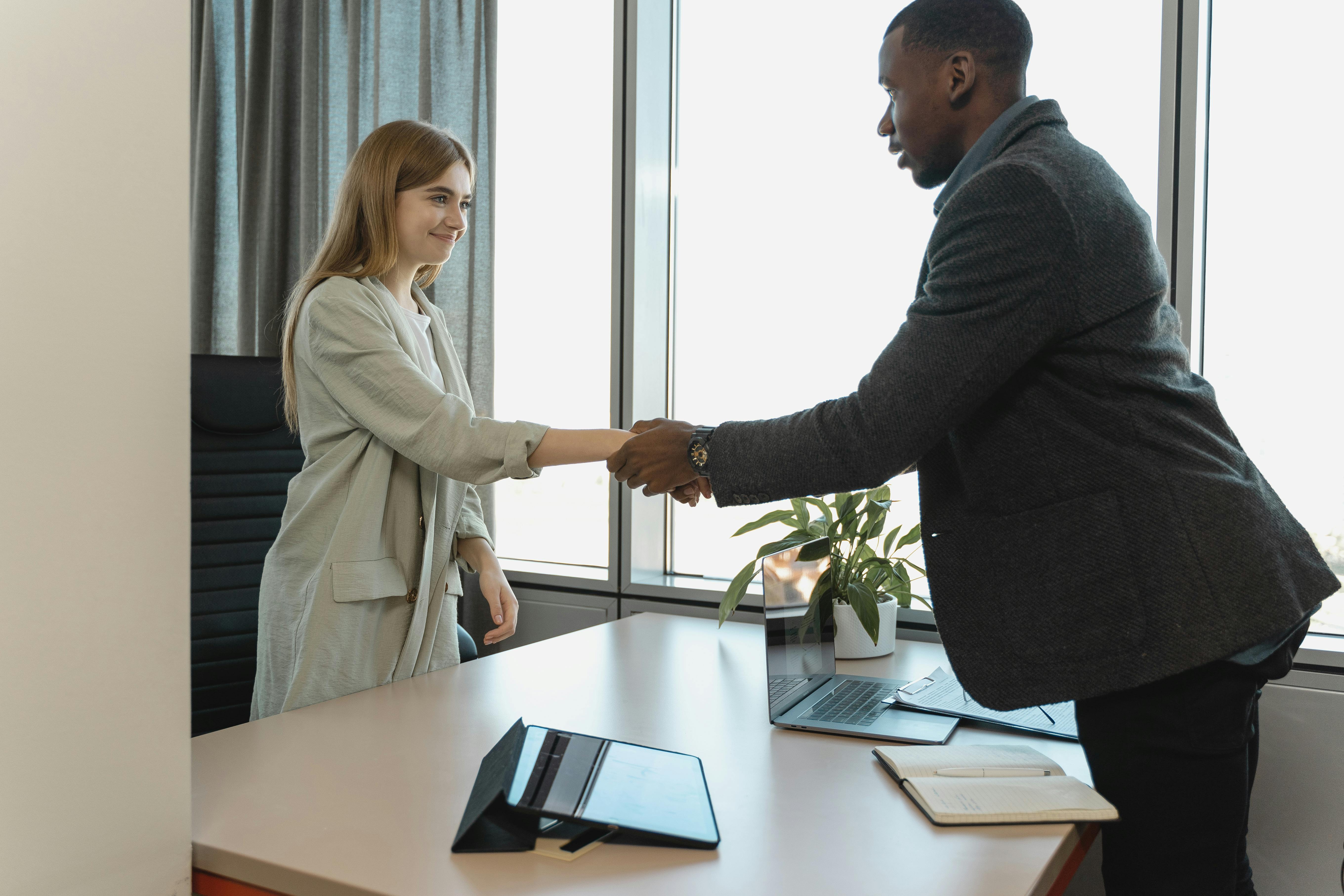 two people shaking hands